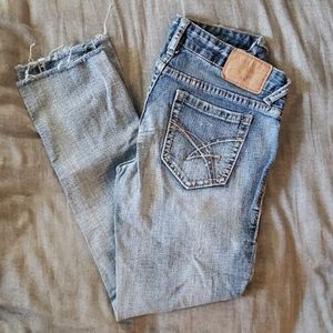 Distressed jean capris